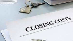 Discussing closing costs and other expenses associated with buying a home