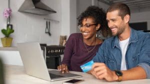 A couple discussing their down payment and purchase price for a new home